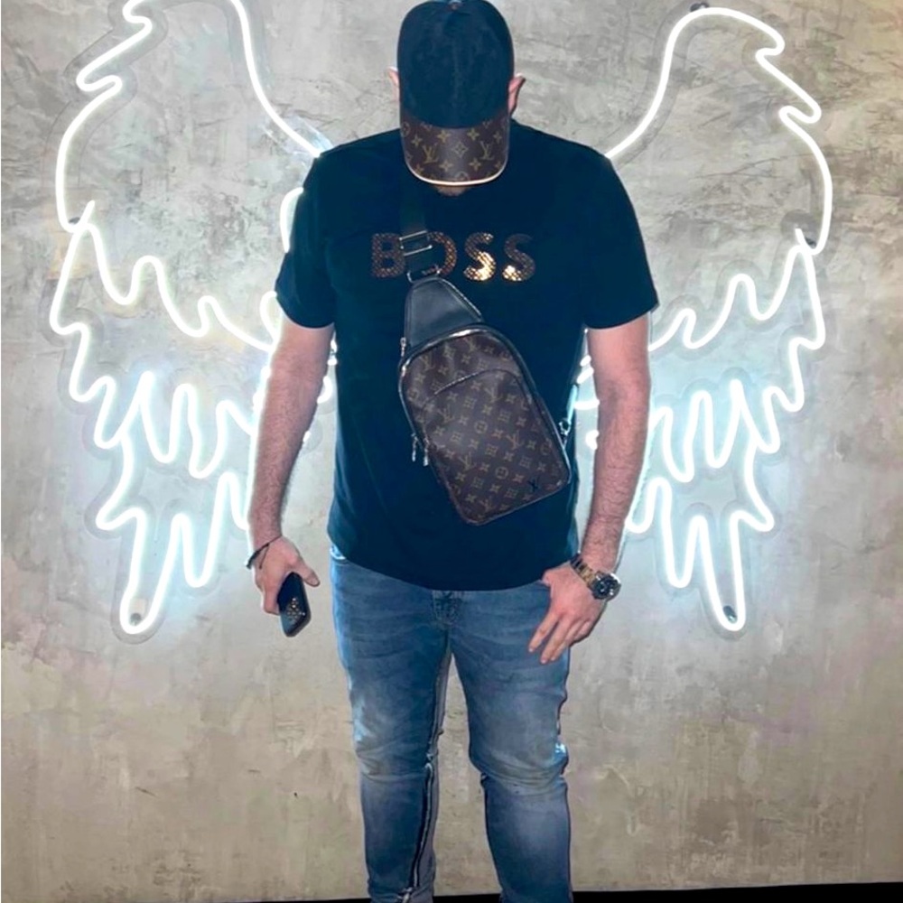 LV Bag and Hat. Used no more then 5 times.